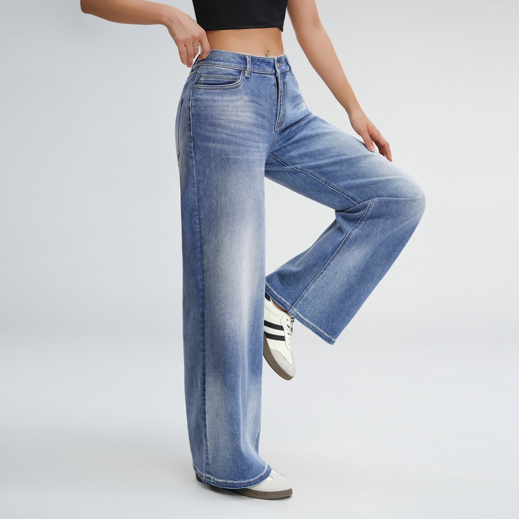 Side walking view of MIGELUN baggy jeans